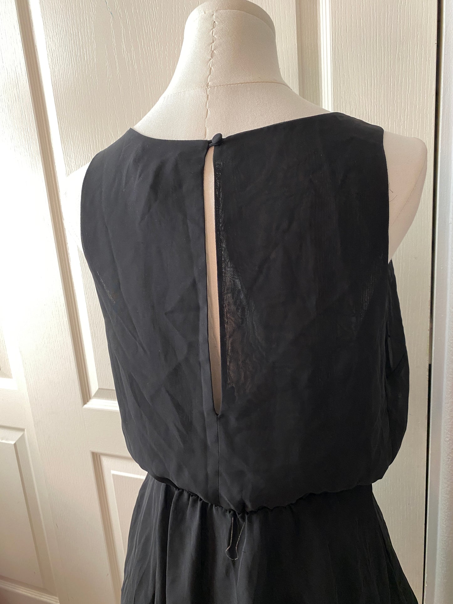 Bisou Bisou Black Blouson Sleeveless Ruffle Feminine Minimalistic Summer Blouse